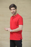 RED PLAIN POLO  WITH EMBROIDERY AT FRONT